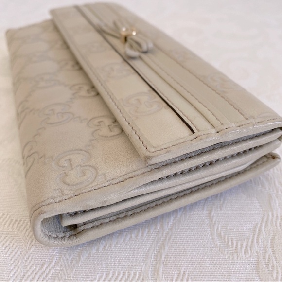 GUCCI Guccissima Bow Signature Wallet - Picture 10 of 14